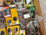 a box full of assorted items sitting on the floor