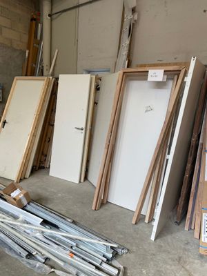 many different types of doors and frames in this garage