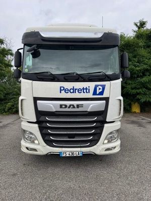 a picture of a white truck parked in a parking lot