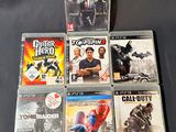 a lot of video games on the table together