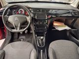 the interior of a car with a steering wheel, dashboard, and dash board