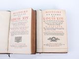 an old book opened to show the title of louis xiv