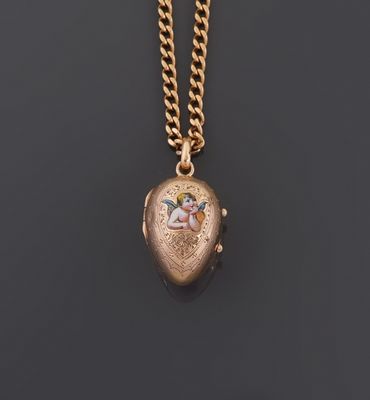 a gold locke with an image of a woman on it