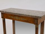 a small table with a marble top on a white background