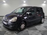 a picture of a small black van parked in a garage