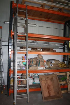 a ladder that is leaning against a wall in a garage