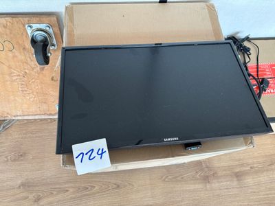 a television that is sitting in a box on the floor