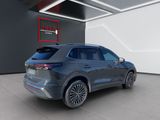 a grey 2020 buick enclave suv parked in a showroom