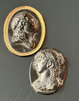 two coins that are sitting next to each other on a table