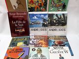 a lot of books that are sitting on a table