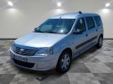 a picture of a silver van parked on a checkered floor