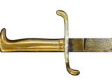 a gold colored sword with a black handle on a white background