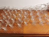 a lot of empty wine glasses sitting on a table