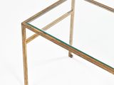 brass and glass coffee table with a glass top