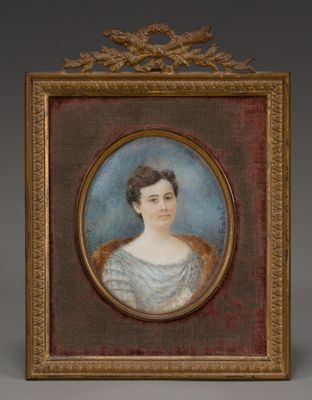 portrait of a woman in a blue dress in a gold frame