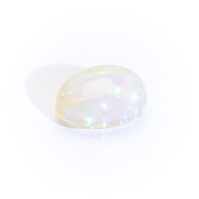 an oval white oplite stone on a white background