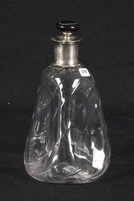 a clear glass bottle with a black lid
