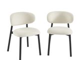 deux chaises blanches aux pieds noirs et à l'assise blanche