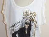 une photo d'un t-shirt sur lequel est représenté un ours