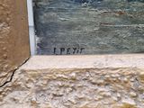 a close up of a painting on a window sill