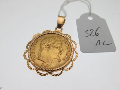 a close up of a gold coin with a price tag on it