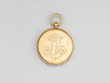 un cadenas en or orné d'un monogramme sur le devant