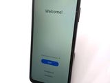 an image of a cell phone with a welcome screen on the screen