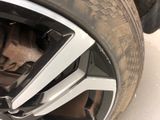 a close up of a tire on a car ' s rim