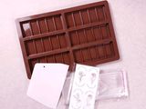 a chocolate tray that has a piece of chocolate in it