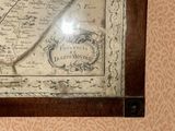 a picture of a map on the wall of a room
