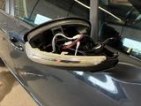 a car door handle with wires and wires in it