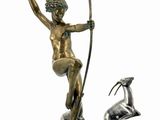 statue of a man with a spear and a goat on a pedestal