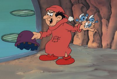 une image représentant un personnage de bande dessinée, un homme vêtu d'une tenue rouge et tenant un poisson