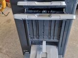an image of a printer sitting on top of a cart
