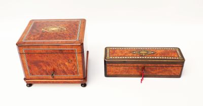 pair of antique wooden boxes on wheels on a white surface