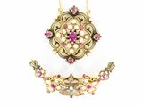 an image of a necklace and earring set with pink stones