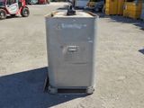 an image of a metal container sitting in a parking lot