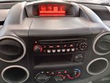 a car dashboard with speakers and a clock on it