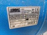 an image of a blue machine that has a label on it