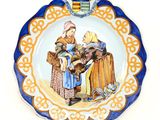 an image of a plate with a picture of a man and a woman