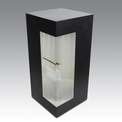 a black box with a clock inside of it