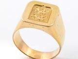 an image of a gold signet ring with a lion on it