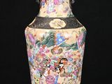 a vase that has a picture of a woman on it