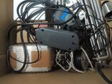 a box with a bunch of wires and other items in it