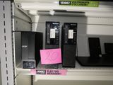 a lot of computer equipment on the shelves in the store