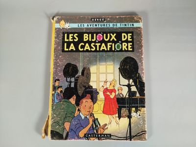 livre pour enfants français « Les Bijoux de la Castafiore », avec l'illustration d'une femme en robe rouge