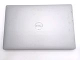 a white laptop with a dell logo on the screen