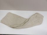 a pair of pants on a table with a laptop