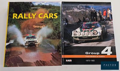 two books about rally cars on display on a table