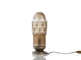 a lamp that is on a table with a white background